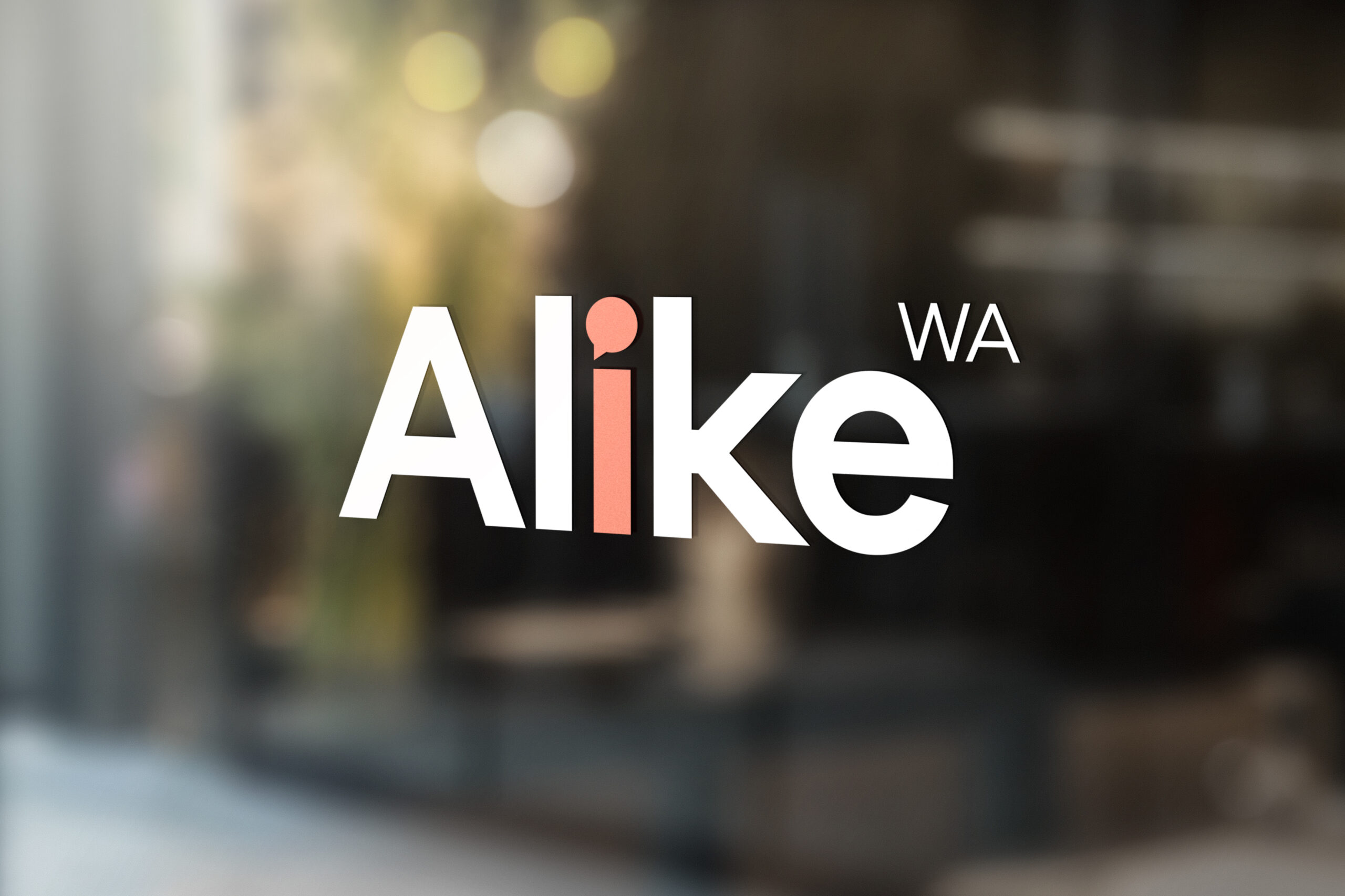 Alike logo on glass door with blurred background