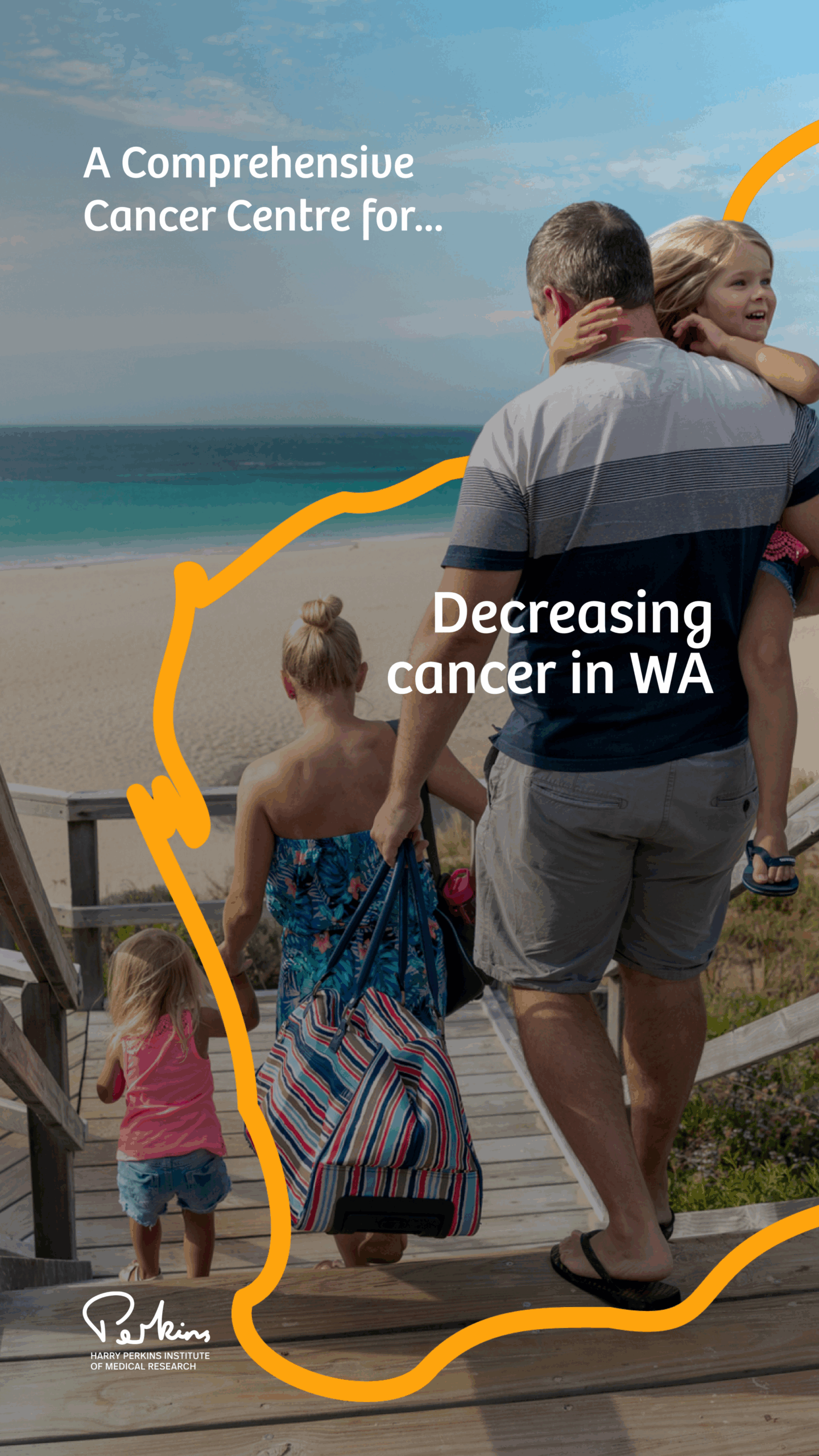Man carrying child looking out over ocean